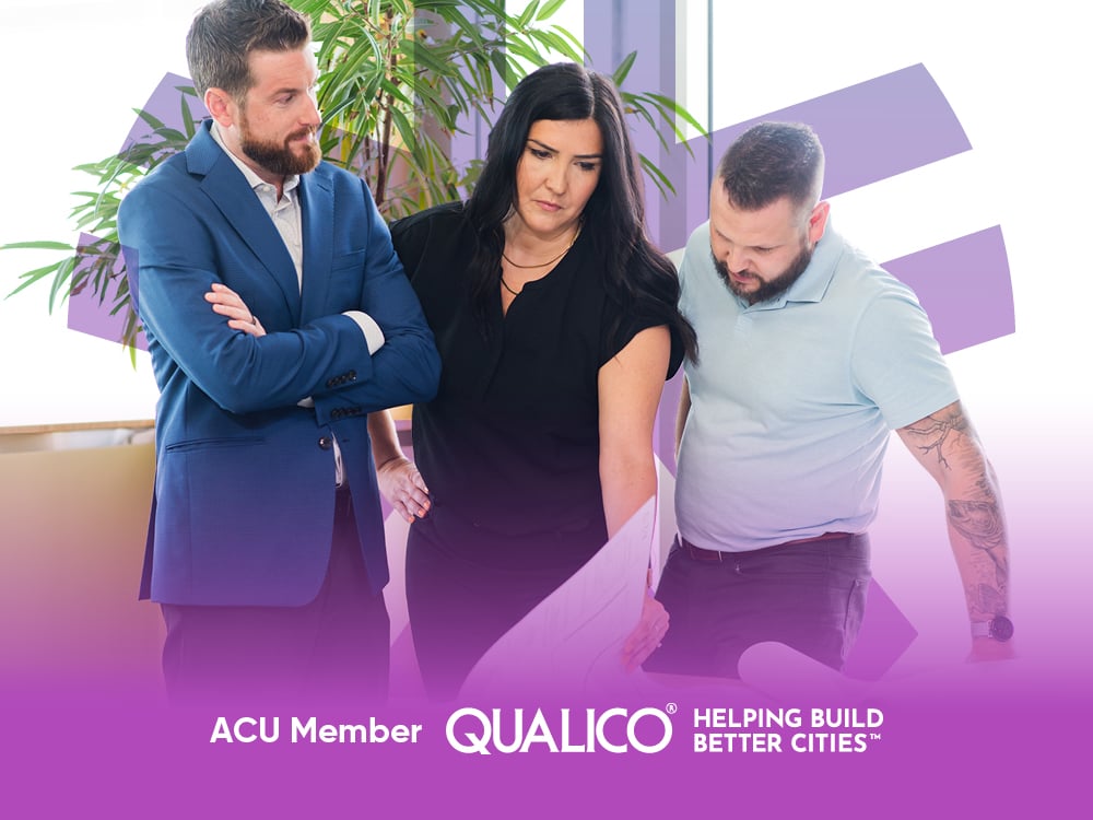 ACU Member Qualico - three individuals reviewing blue prints