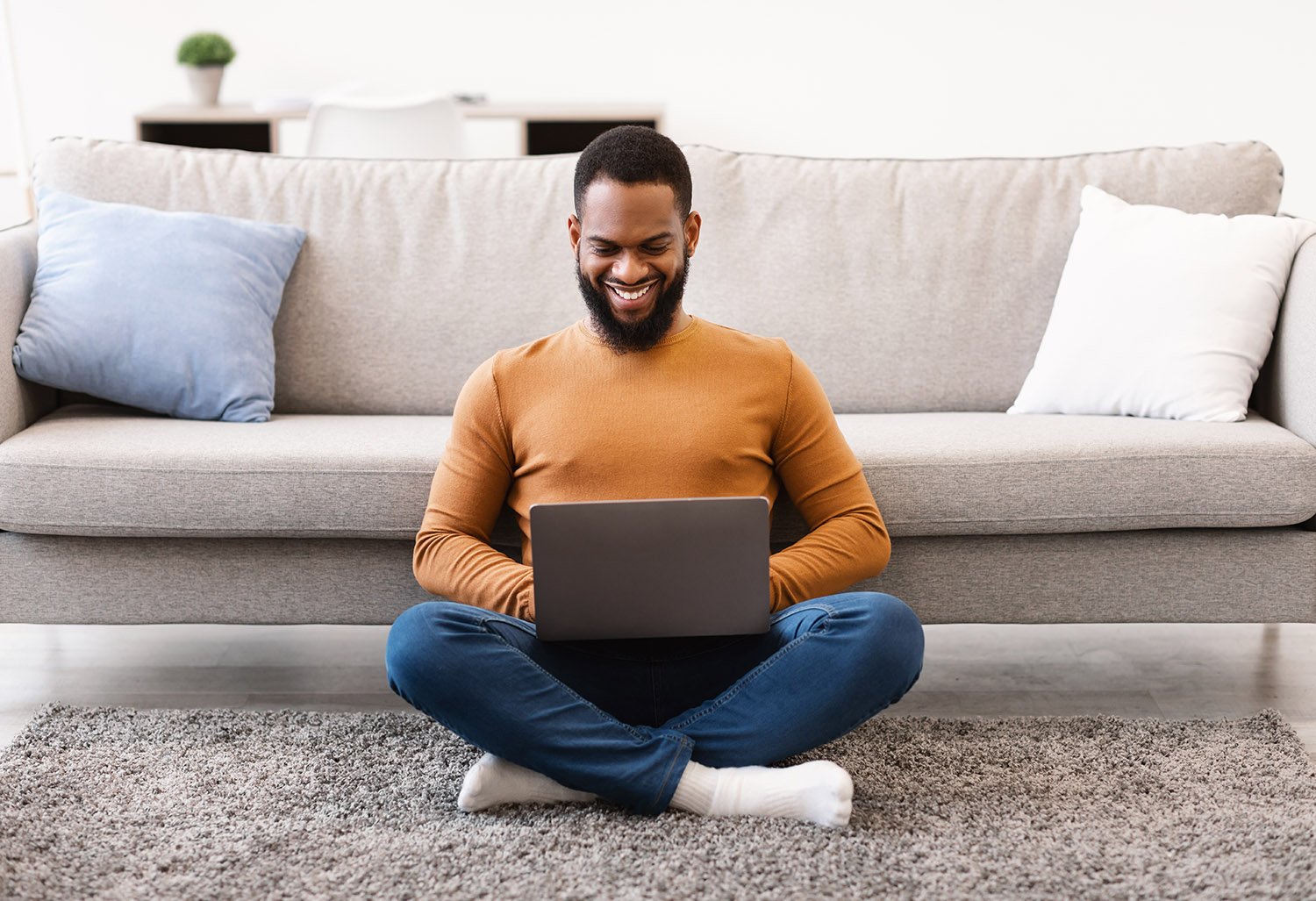 Bipoc-man-on-laptop