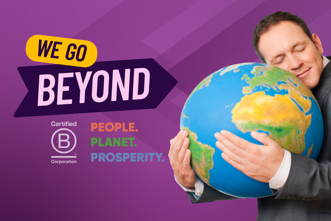  a photo of a man hugging a globe with the lettering saying We go beyond and People Planet And Prosperity Bcorp